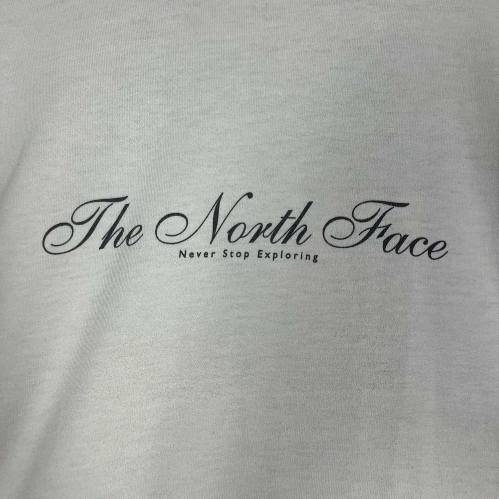 Vintage The North Face T-Shirt Mens Medium White Script Logo Graphic Tee